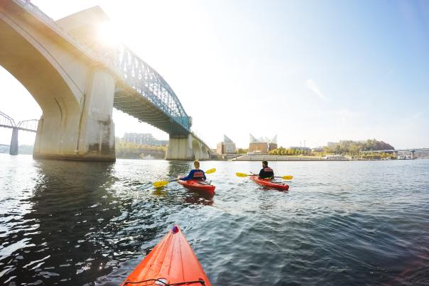 People Kayaking under the Market Street Bridge